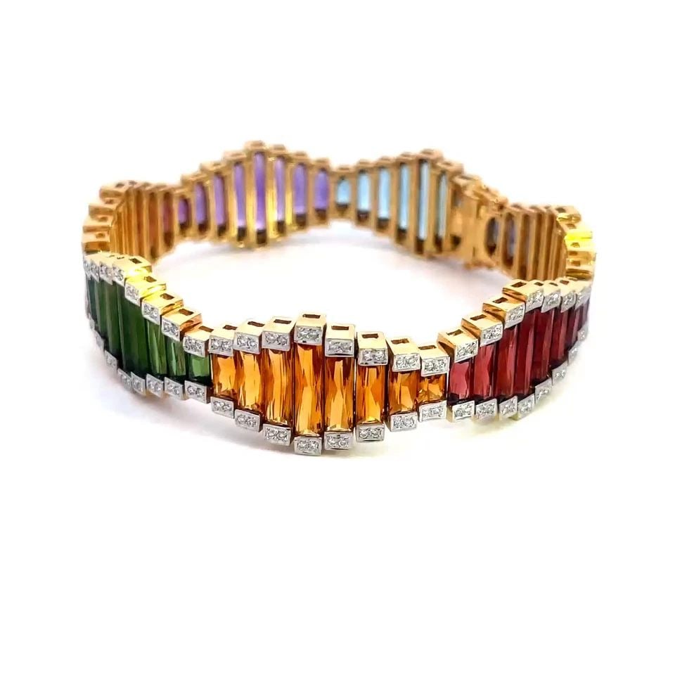 BELLARRI GOLD RAINBOW BRACELET DIAMOND & GEMS 18K TWO-TONE GEOMETRIC LINKS: BELLARRI GOLD RAINBOW BRACELET DIAMOND & GEMS 18K TWO-TONE GEOMETRIC LINKS This gorgeous bracelet is by Bellarri, it features 18k yellow gold accented with white gold, decorated with diamond and multi