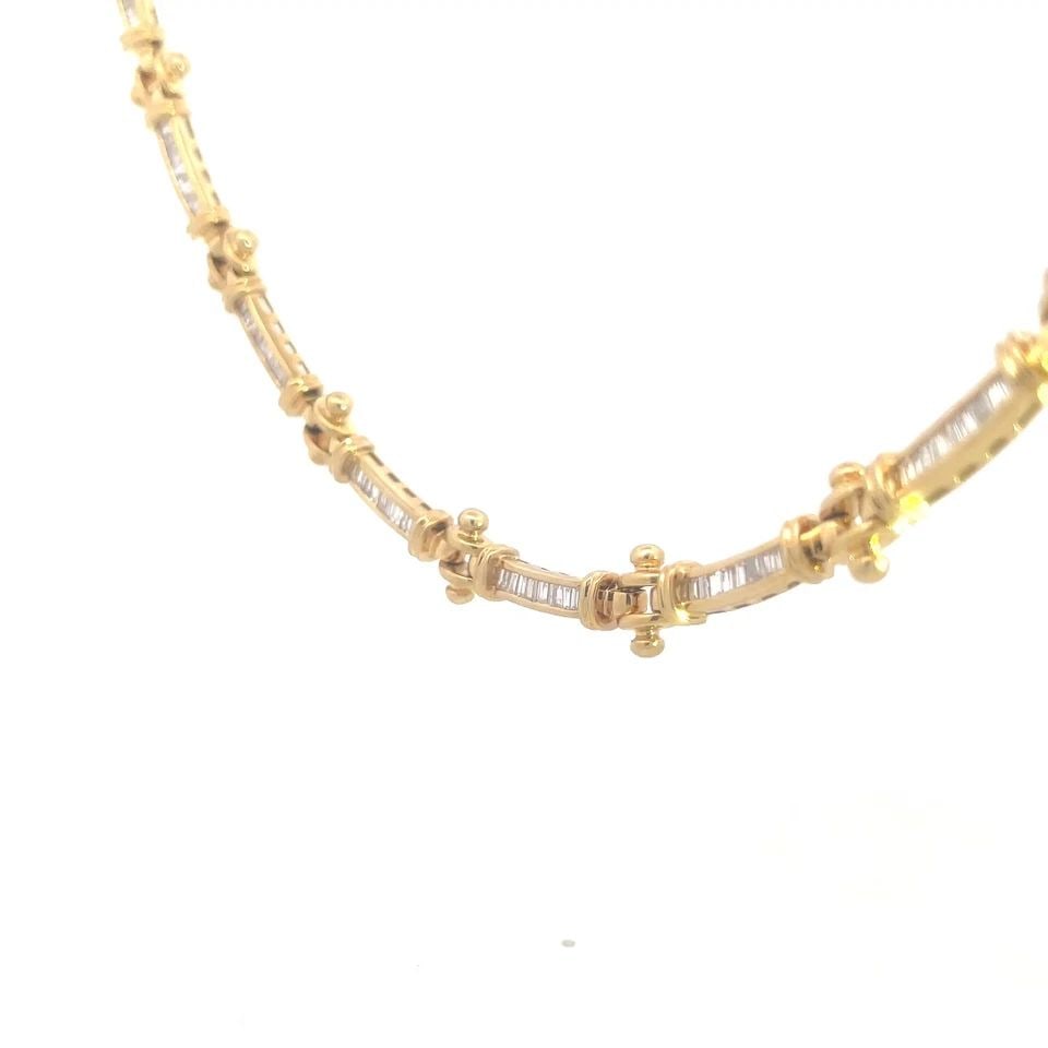 DIAMOND 4CT GOLD COLLAR NECKLACE 18K YELLOW BAGUETTES BAR LINK STYLE: DIAMOND 4CT GOLD COLLAR NECKLACE 18K YELLOW BAGUETTES BAR LINK STYLE Add this luxurious diamond necklace to your jewelry collection with timeless elegance. It is crafted in 18k yellow gold, this exqui