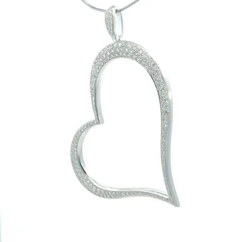 PIAGET 3CT PAVE DIAMOND 18K WHITE GOLD EXTRA LARGE HEART PENDANT: PIAGET 3CT PAVE DIAMOND 18K WHITE GOLD EXTRA LARGE HEART PENDANT This stunning authentic pendant is by Piaget, it is crafted from 18k white gold with a fine polished finish. The pendant features an ex
