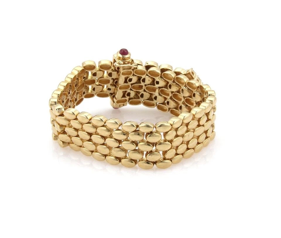 DIAMOND GOLD BRACELET PANTHER LINK 14KT YELLOW BELT STYLE: DIAMOND GOLD BRACELET PANTHER LINK 14KT YELLOW BELT STYLE This Diamond Panther Bracelet in 14kt Gold is a stunning piece of fine jewelry. The natural diamond set in a bezel with gemstones accents adds