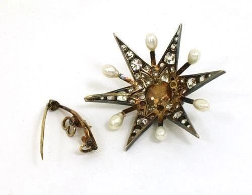 DIAMONDS & PEARLS STAR BROOCH PENDANT ANTIQUE IN 14K GOLD: DIAMONDS & PEARLS STAR BROOCH PENDANT ANTIQUE IN 14K GOLD The Diamonds & Pearls Star Brooch Pendant Antique in 14k Gold is a stunning piece of fine jewelry that exudes elegance and sophistication. The