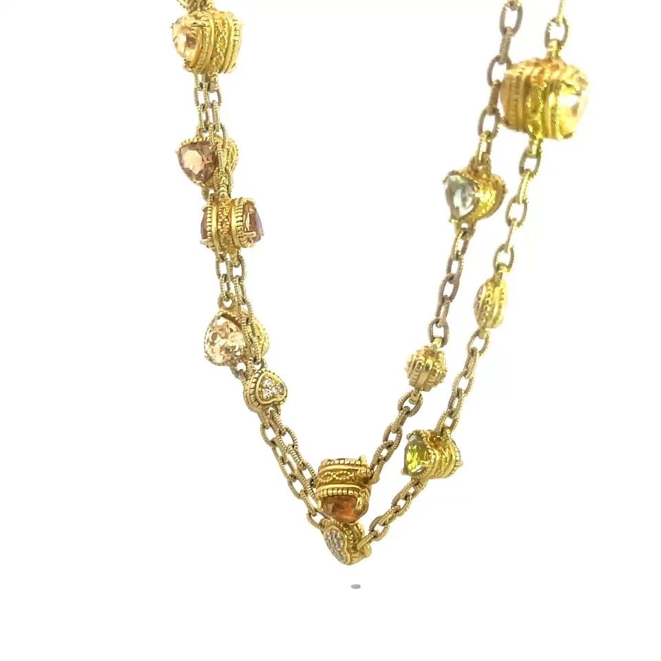 JUDITH RIPKA DIAMOND GOLD NECKLACE 18K YELLOW HEARTS MOTIF GEMSTONES 34" LONG: JUDITH RIPKA DIAMOND GOLD NECKLACE 18K YELLOW HEARTS MOTIF GEMSTONES 34" LONG This gorgeous Judith Ripka necklace features a long textured oval link chain with assorted shape and size hearts motif att