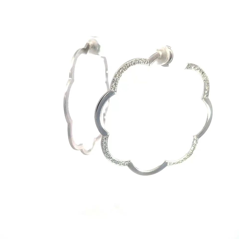 CHANEL CAMELLIA DIAMOND GOLD EARRINGS 18K WHITE FLORAL HOOP STYLE POUCH: CHANEL CAMELLIA DIAMOND GOLD EARRINGS 18K WHITE FLORAL HOOP STYLE POUCH From the Camellia Collection by CHANEL, this eye-catching large pair of flower hoop earrings features a beautiful open style cam