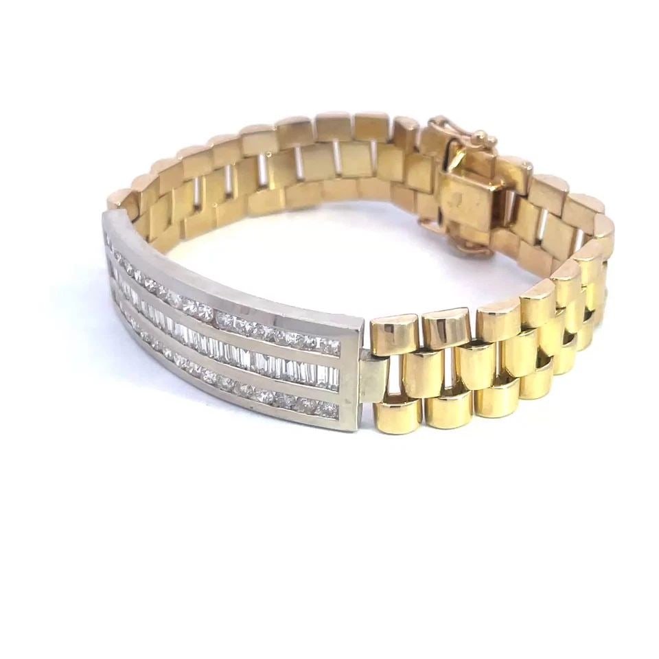 DIAMOND GOLD MEN'S BRACELET CURVED BAR JUBILEE LINK BRACELET: DIAMOND GOLD MEN'S BRACELET CURVED BAR JUBILEE LINK BRACELET This bold eye-catching men's bracelet is crafted from 14k yellow and white gold, the center has a 14mm wide curved bar with 3 rows of chann