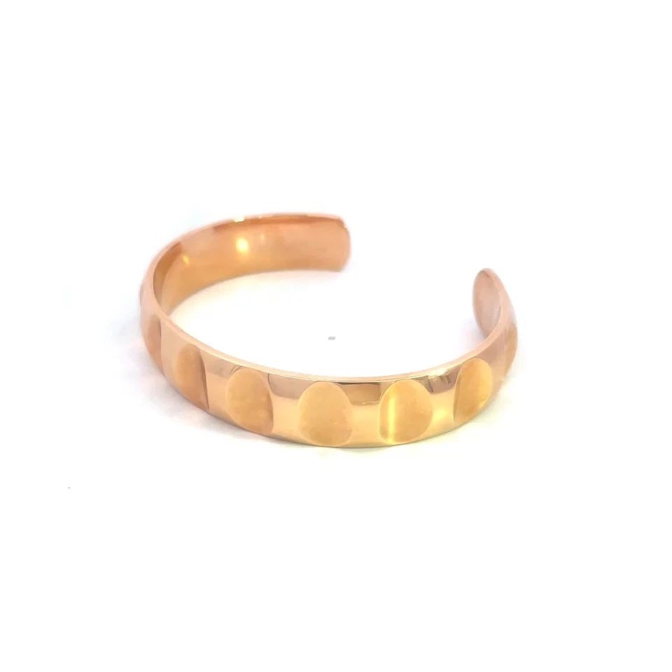 TIFFANY & CO. PICASSO GROOVED GOLD BRACELET WIDE 18K ROSE CUFF STYLE: The Tiffany & Co. Picasso wide band bracelet is crafted from 18k rose gold with a cuff style 12mm wide and has oval shaped indents across the entire band. Signed by Tiffany & Co., this rose gold brace
