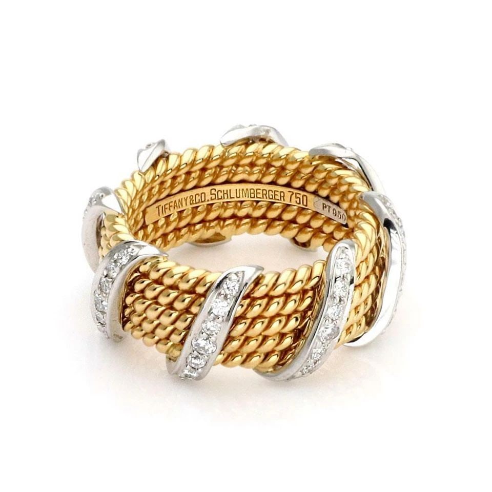 TIFFANY & CO. SCHLUMBERGER DIAMOND RING 18K GOLD PLATINUM 5 ROWS BAND: TIFFANY & CO. SCHLUMBERGER DIAMOND RING 18K GOLD PLATINUM 5 ROWS BAND Tiffany & Co. Schlumberger Diamond 18k Gold Platinum 5 Rows Band Ring Description This is an authentic Jean Schlumberger's renditi