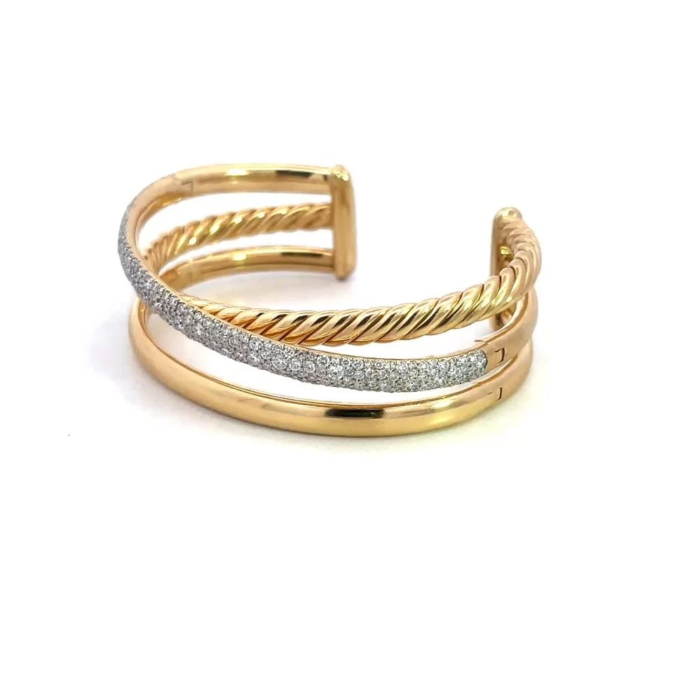 DAVID YURMAN CROSSOVER GOLD BRACELET DIAMOND 18K YELLOW 3 BAND CUFF STYLE: The David Yurman Crossover Gold Bracelet is a stunning piece of fine jewelry featuring a classic cuff style design with three bands. Made with 18k yellow gold and one is accented with pave set diamond