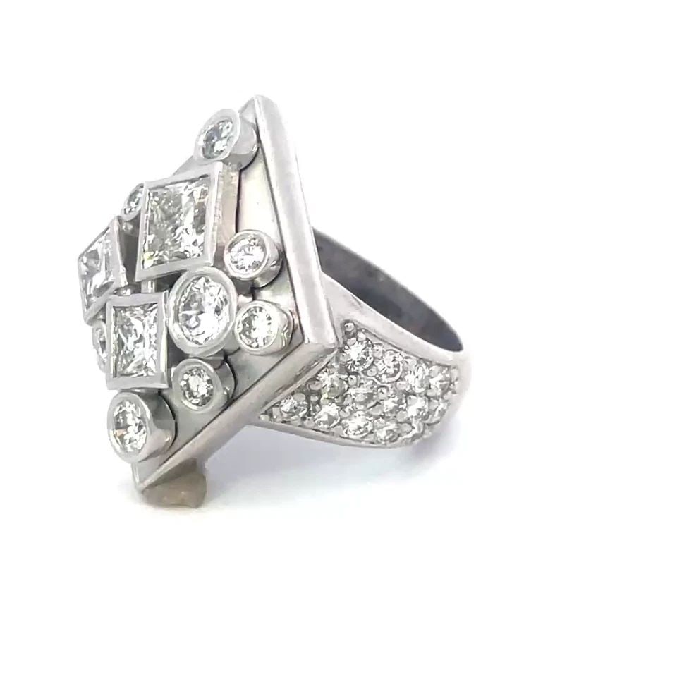 DIAMOND GOLD RING 5.5CT 14K WHITE GOLD RHOMBUS SHAPE 7.5 MIXED CUT: DIAMOND GOLD RING 5.5CT 14K WHITE GOLD RHOMBUS SHAPE 7.5 MIXED CUT This is a unique and stunning unisex ring, it is crafted from 14k white gold featuring a rhombus shape top, hallow on the inside with