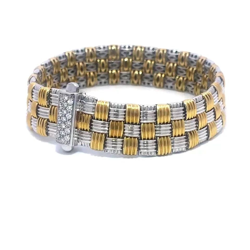 ROBERTO COIN APPASSIONATA GOLD BRACELET DIAMOND 18K TWO TONE BASKET STYLE: From the Appassionata Collection by Roberto Coin, this vintage bracelet is a stunning piece of fine jewelry featuring a triple row woven design in 18k yellow and white gold. This grooved style basket 