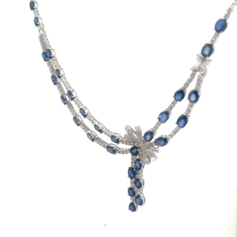SAPPHIRE DIAMOND GOLD NECKLACE 18K WHITE COCKTAIL CENTERPIECE RIBBON BOW: SAPPHIRE DIAMOND GOLD NECKLACE 18K WHITE COCKTAIL CENTERPIECE RIBBON BOW The double row centerpiece stunning necklace is crafted from 18k white gold featuring oval shape sapphires with prong set diamo