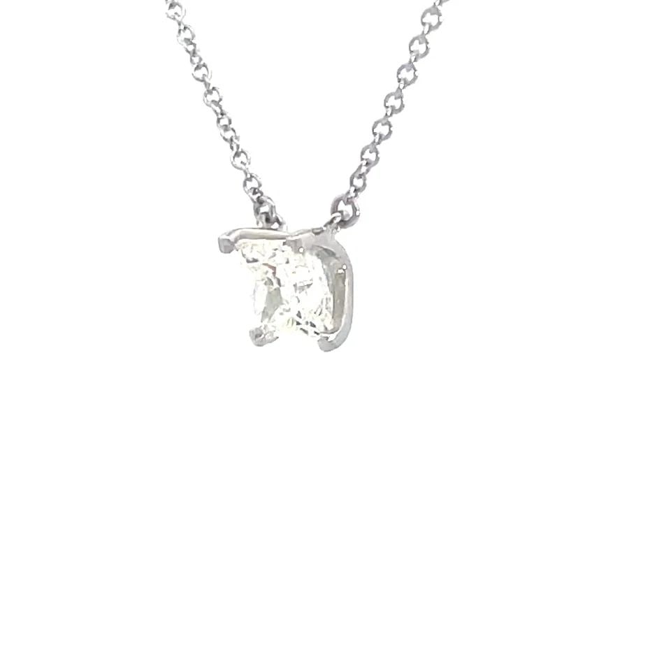 TIFFANY & CO. DIAMOND SOLITAIRE PENDANT PRINCESS CUT 1.15CT PLATINUM CHAIN: TIFFANY & CO. DIAMOND SOLITAIRE PENDANT PRINCESS CUT 1.15CT PLATINUM CHAIN This elegant necklace is from Tiffany & Co. featuring a stunning VS1 princess cut diamond in platinum four prong basket setti