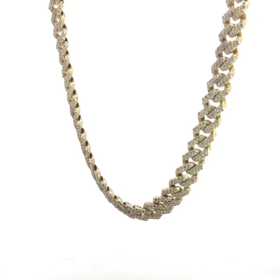 70405 DIAMOND 7CT GOLD CUBAN LINK CHAIN ICED OUT 10K 22.5" LONG: 70405 DIAMOND 7CT GOLD CUBAN LINK CHAIN ICED OUT 10K 22.5" LONG This is a 6mm wide Cuban Link chain crafted from 10k yellow gold and the entire length of the chain has pave set diamonds with an approx