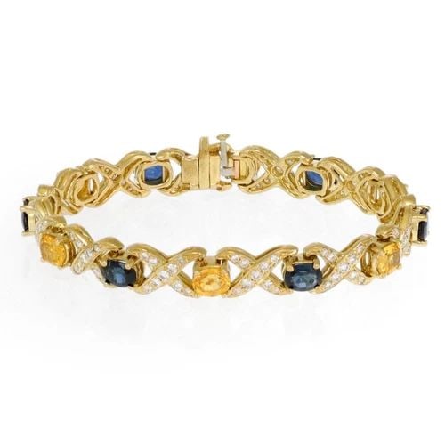 DIAMOND SAPPHIRE 18K YELLOW GOLD 8MM WIDE X LINK BRACELET: DIAMOND SAPPHIRE 18K YELLOW GOLD 8MM WIDE X LINK BRACELET Diamond Sapphire 18k Yellow Gold 8mm Wide X Link Bracelet Description This lovely bracelet is crafted from 18k yellow gold featuring alternati