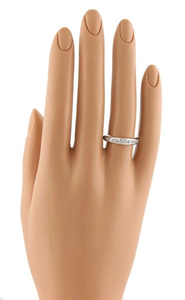 TIFFANY & CO. LUCIDA DIAMONDS PLATINUM RING PRINCESS CUT HALF CIRCLE: TIFFANY & CO. LUCIDA DIAMONDS PLATINUM RING PRINCESS CUT HALF CIRCLE The Tiffany & Co. Lucida Diamonds Platinum Ring features a stunning princess cut diamond set in 950 platinum. This elegant ring fro