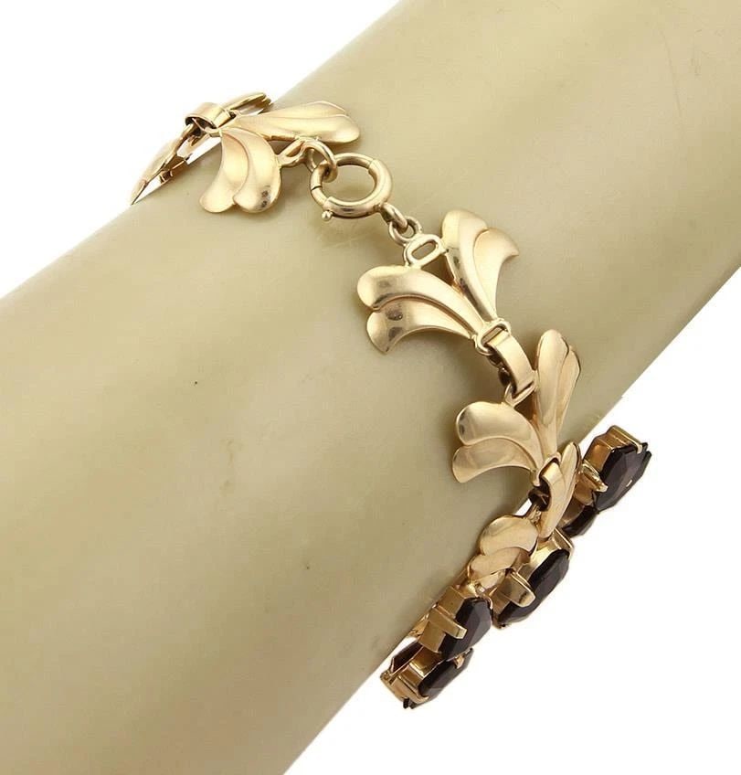 RETRO GOLD & GEMS BRACELET 14K YELLOW WIDE FLORAL LINK VINTAGE: RETRO GOLD & GEMS BRACELET 14K YELLOW WIDE FLORAL LINK VINTAGE The product is a vintage Gemstone Bracelet made with 14k yellow gold. This wide floral link bracelet features natural gemstones set in th