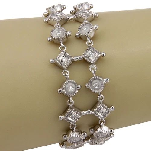 DIAMOND GOLD BRACELET 14K WHITE RHOMBUS & ROUND LINK STYLE: DIAMOND GOLD BRACELET 14K WHITE RHOMBUS & ROUND LINK STYLE This beautiful bracelet is crafted from 14k white gold featuring a double row with rhombus and round links, all set with round cut diamonds. 