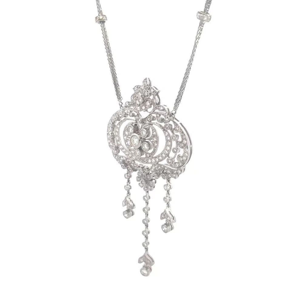 VICTORIAN STYLE DIAMOND GOLD PENDANT 18K WHITE DOUBLE CHAIN NECKLACE: VICTORIAN STYLE DIAMOND GOLD PENDANT 18K WHITE DOUBLE CHAIN NECKLACE This is a gorgeous Victorian style pendant and chain necklace; it is crafted from 18k white gold. The crest shape floral style pend