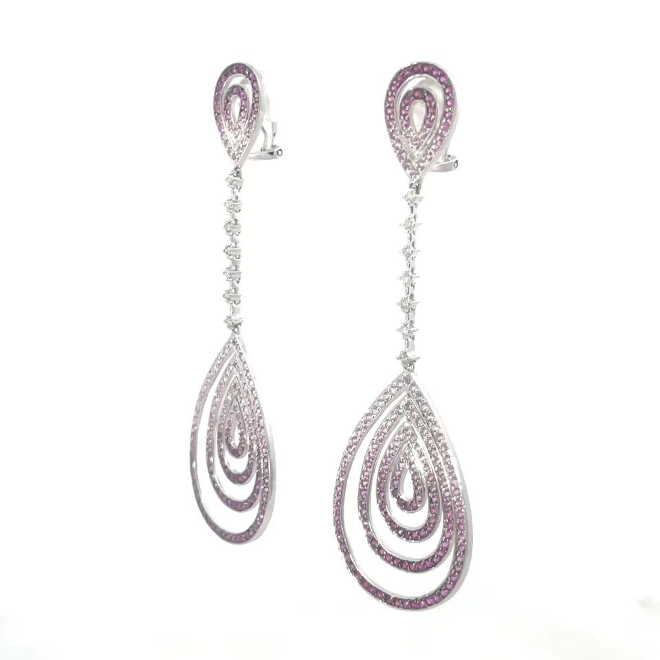 DIAMOND SAPPHIRE GOLD EARRINGS 18K LONG DANGLE TEARDROP STYLE: DIAMOND SAPPHIRE GOLD EARRINGS 18K LONG DANGLE TEARDROP STYLE These gorgeous long drop dangle earrings are crafted from 18k white gold featuring 2 row teardrop top with deep to light pink sapphires, b