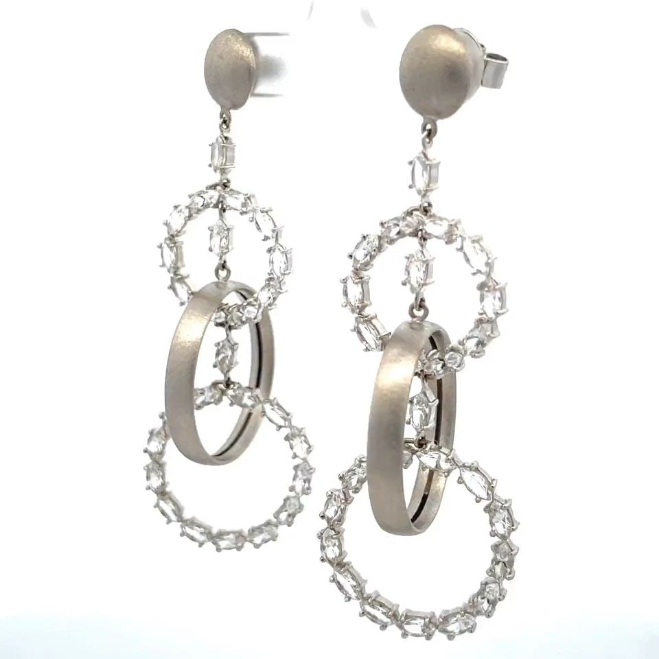 CARLA AMORIM 18K WHITE GOLD TOPAZ TRIPLE HOOP DANGLE EARRINGS: CARLA AMORIM 18K WHITE GOLD TOPAZ TRIPLE HOOP DANGLE EARRINGS This gorgeous authentic pair of earrings are by designer Carla Amorim, it is crafted from 18k white gold featuring triple hoop style with 