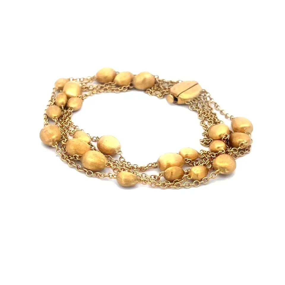 MARCO BICEGO SIVIGLIA GOLD BRACELET 18K YELLOW 5 STRAND BEADED CHAIN STYLE: MARCO BICEGO SIVIGLIA GOLD BRACELET 18K YELLOW 5 STRAND BEADED CHAIN STYLE The Marco Bicego Siviglia Gold Bracelet is an exceptional piece of fine jewelry, crafted from 18k yellow gold featuring the 5