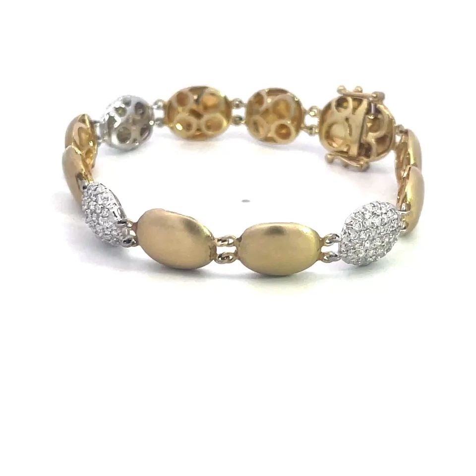 70529 DIAMOND GOLD BRACELET 14K TWO TONE PAVE SET OVAL BUTTON LINK STYLE: 70529 DIAMOND GOLD BRACELET 14K TWO TONE PAVE SET OVAL BUTTON LINK STYLE This is a gorgeous diamond bracelet; it is crafted from 14k yellow gold with white gold accent that adds an elegant touch to an