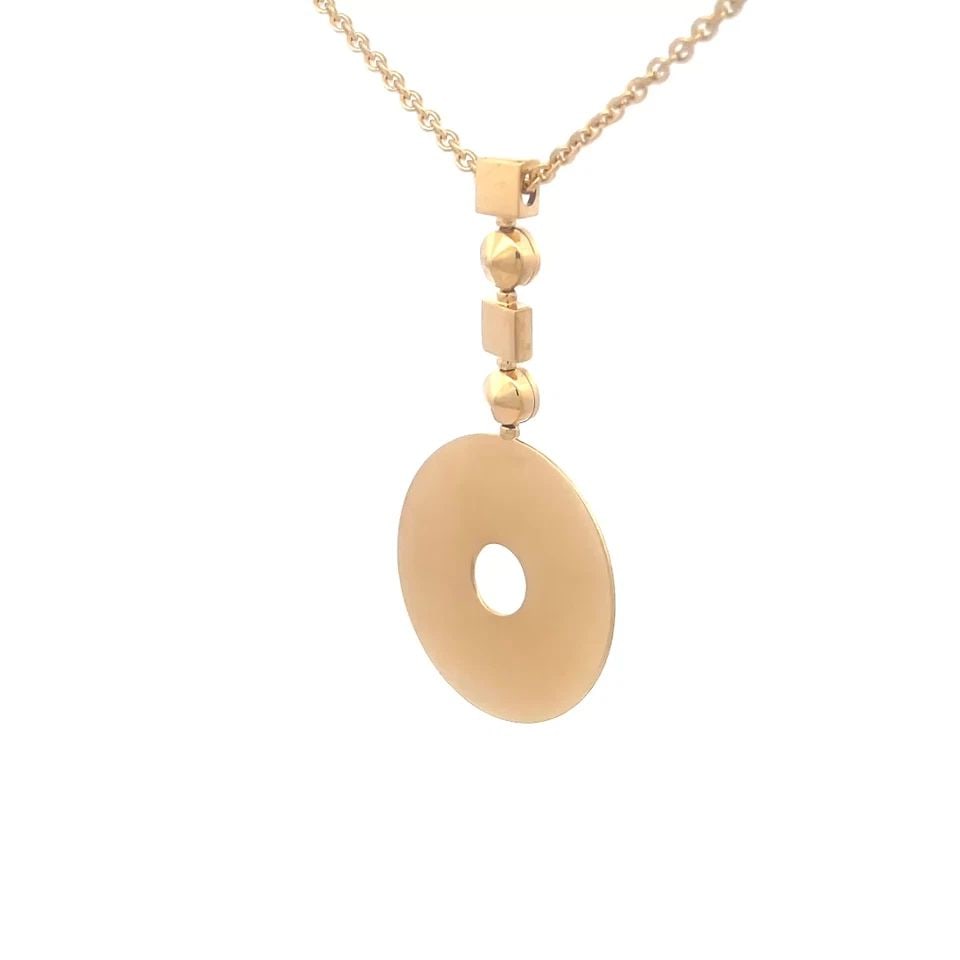 BVLGARI LUCIA GOLD NECKLACE 18K YELLOW DISC PENDANT W/CHAIN BOX: This beautiful necklace is by Bvlgari from the Lucia Collection, it is a stunning piece of fine jewelry featuring an 18k yellow gold pendant in the shape of a round disc. The necklace comes with a mat