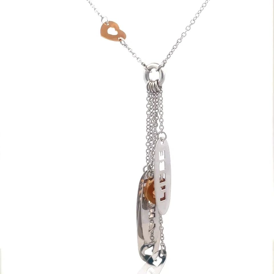 GOLD 18K LOVE PENDANT NECKLACE TWO TONE 4 DANGLE STENCIL PENDANT: GOLD 18K LOVE PENDANT NECKLACE TWO TONE 4 DANGLE STENCIL PENDANT The necklace is an 18k white gold love pendant with a pink and yellow gold accent, The pendant has 5 long oval shaped thin stencil desi