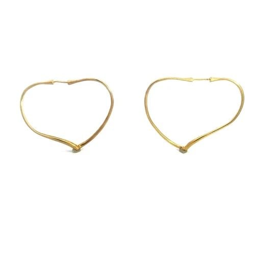 TIFFANY & CO. PERETTI GOLD EARRINGS 18K YELLOW OPEN HEART HOOP STYLE: TIFFANY & CO. PERETTI GOLD EARRINGS 18K YELLOW OPEN HEART HOOP STYLE This is a chic authentic pair of earrings from Tiffany & Co. by designer Elsa Peretti, it is crafted from 18k yellow gold with a po