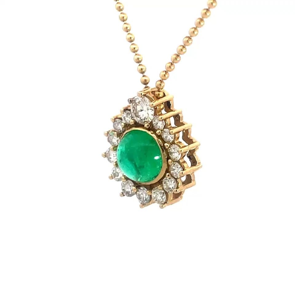 DIAMOND EMERALD GOLD NECKLACE 14K YELLOW PEAR HALO PENDANT BEAD CHAIN: DIAMOND EMERALD GOLD NECKLACE 14K YELLOW PEAR HALO PENDANT BEAD CHAIN This lovely diamond and emerald 14k yellow gold necklace is a stunning piece of fine jewelry featuring a pear-shaped prong frame w