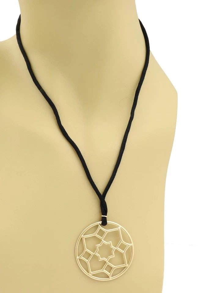TIFFANY & CO. ROUND PENDANT PICASSO ZELLIGE 18K GOLD CORD NECKLACE LARGE: TIFFANY & CO. ROUND PENDANT PICASSO ZELLIGE 18K GOLD CORD NECKLACE LARGE Tiffany & Co. Picasso Zellige 18k Gold Large Round Pendant Cord Necklace Description The lovely Zellige collection from Tiffany