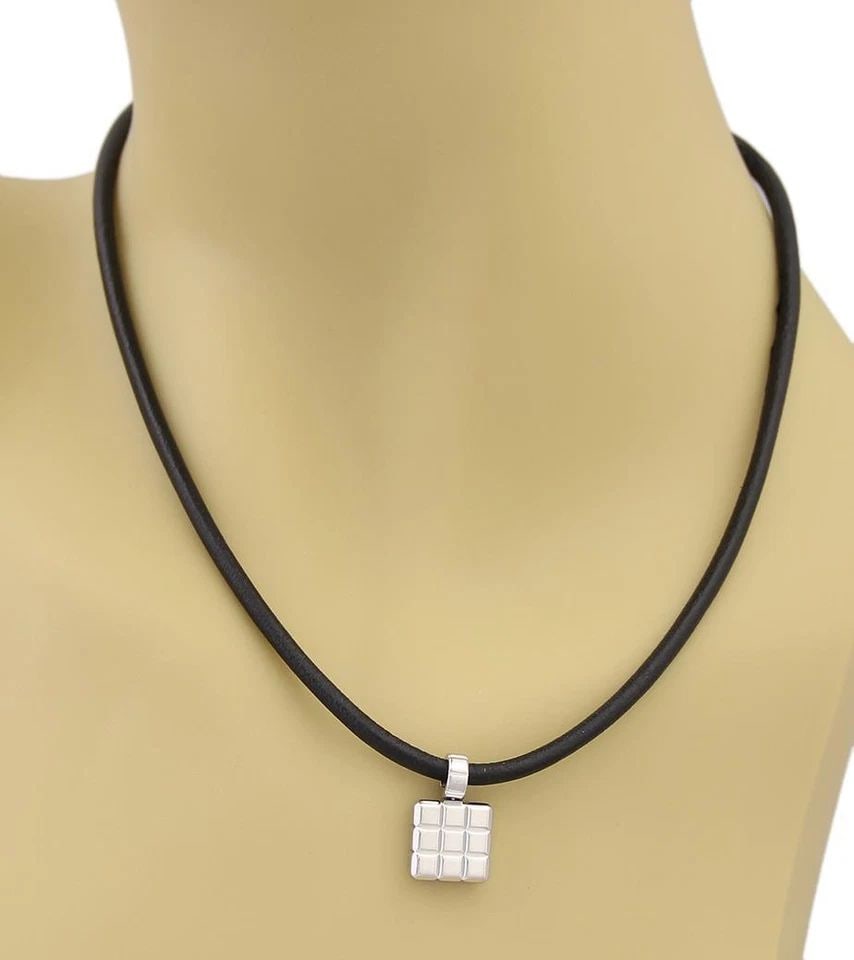 CHOPARD GOLD PENDANT 18K WHITE CUBE STYLE CORD NECKLACE: CHOPARD GOLD PENDANT 18K WHITE CUBE STYLE CORD NECKLACE The Chopard gold pendant and cord necklace is a fine piece of jewelry, the pendant is crafted from 18k white gold featuring a square shape with 