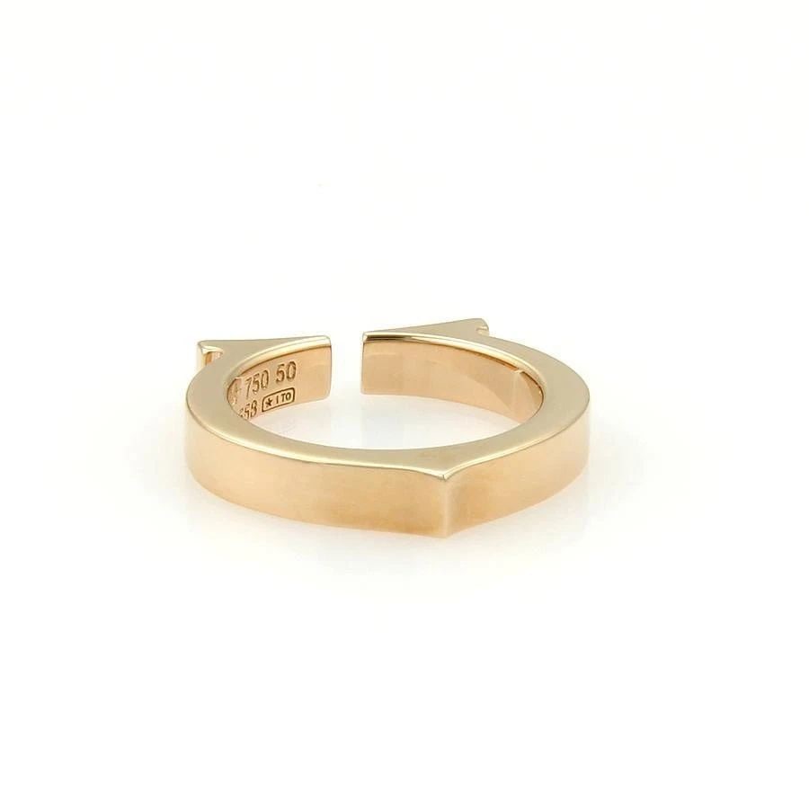 CARTIER C LOGO GOLD RING 18K PINK CUFF BAND SIZE 5.25 W/BOX: CARTIER C LOGO GOLD RING 18K PINK CUFF BAND SIZE 5.25 W/BOX The Cartier C Logo Gold Ring is a luxurious piece of fine jewelry made with 18k rose gold. It features a stylish pink cuff band design with 