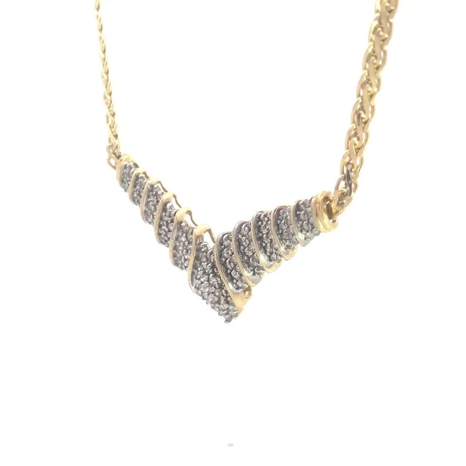70533 DIAMOND GOLD NECKLACE 10K TWO TONE WING SHAPE S LINK CHAIN: 70533 DIAMOND GOLD NECKLACE 10K TWO TONE WING SHAPE S LINK CHAIN This lovely necklace is crafted from 10k yellow gold with white gold accent, it features a wide wing shape pendant attached to a flat s