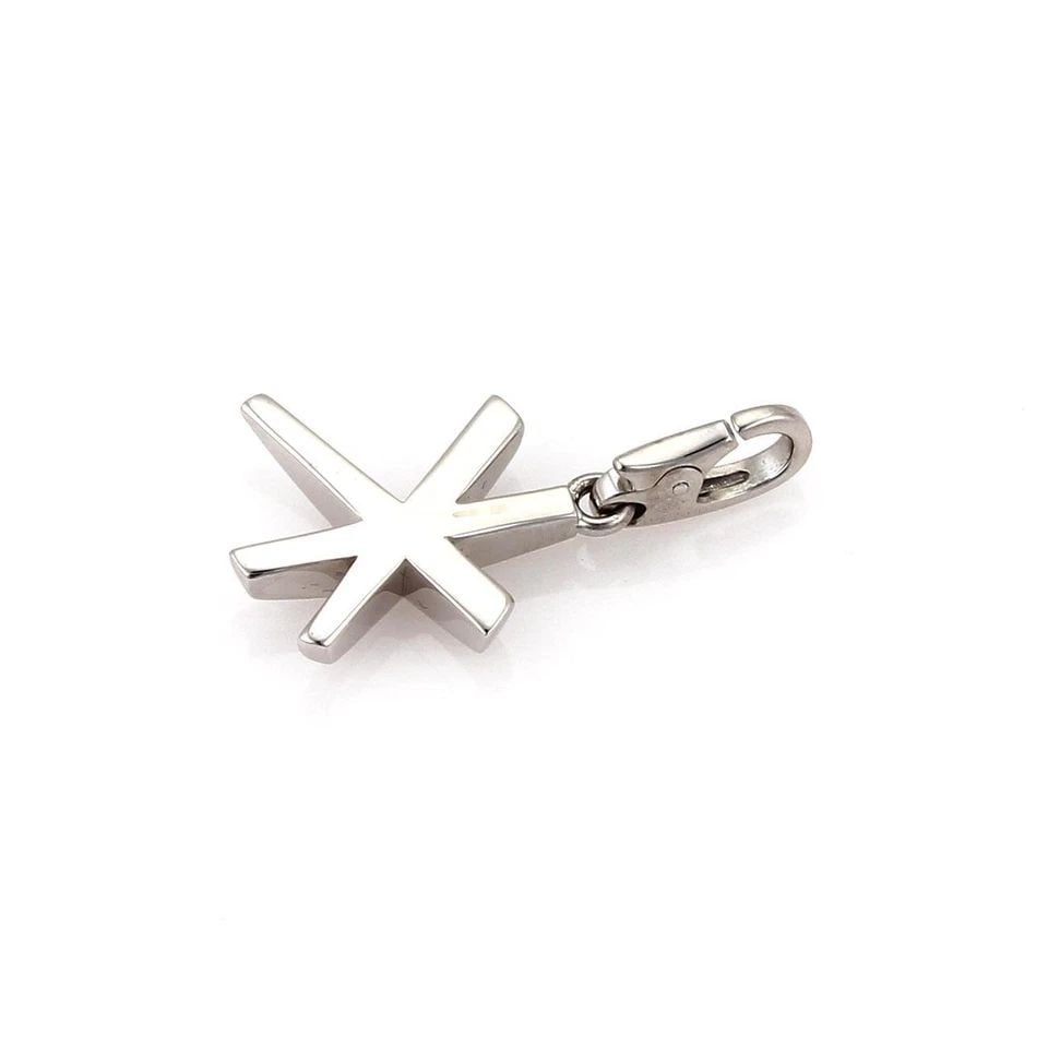 CARTIER 18K WHITE GOLD STAR CHARM PENDANT W/CERTIFICATE: CARTIER 18K WHITE GOLD STAR CHARM PENDANT W/CERTIFICATE Cartier 18k White Gold Star Charm Pendant w/Certificate Description This elite authentic charm pendant is by Cartier, it is crafted from 18k whi