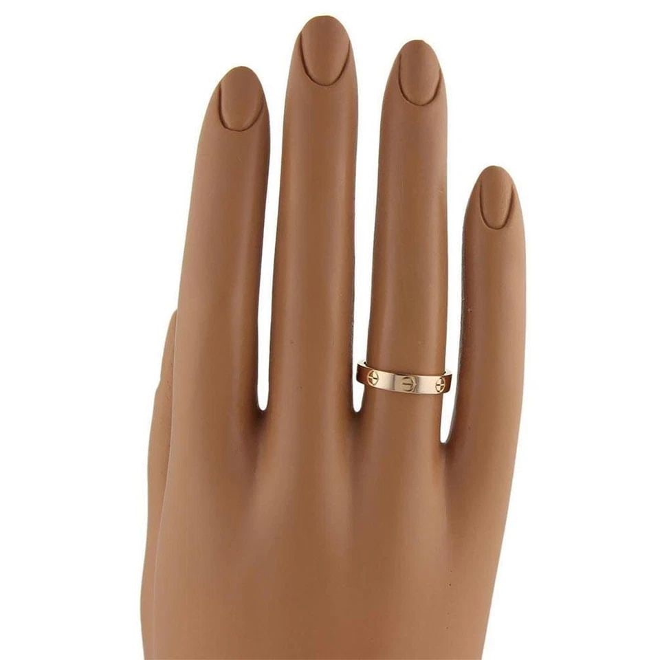 CARTIER MINI LOVE 18K PINK GOLD 3.6MM BAND RING SIZE: 49 - US 5: CARTIER MINI LOVE 18K PINK GOLD 3.6MM BAND RING SIZE: 49 - US 5 Cartier Mini Love 18k Pink Gold 3.6mm Band Ring Size: 49 - US 5 Description This is an authentic band ring by Cartier, this beautiful au