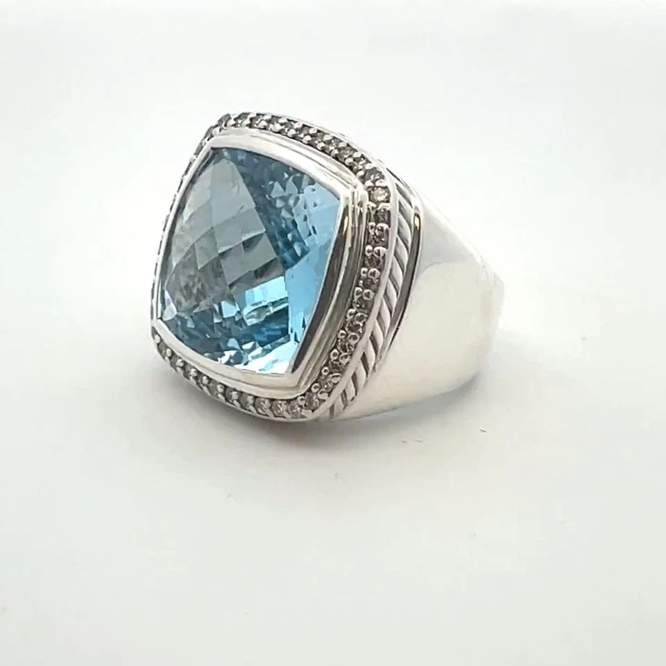 DAVID YURMAN RING ALBION DIAMOND BLUE GEMSTONE STERLING SILVER: DAVID YURMAN RING ALBION DIAMOND BLUE GEMSTONE STERLING SILVER The David Yurman Albion Diamond Blue Gemstone Sterling Silver Ring is a stunning piece of fine jewelry designed for women. This particula