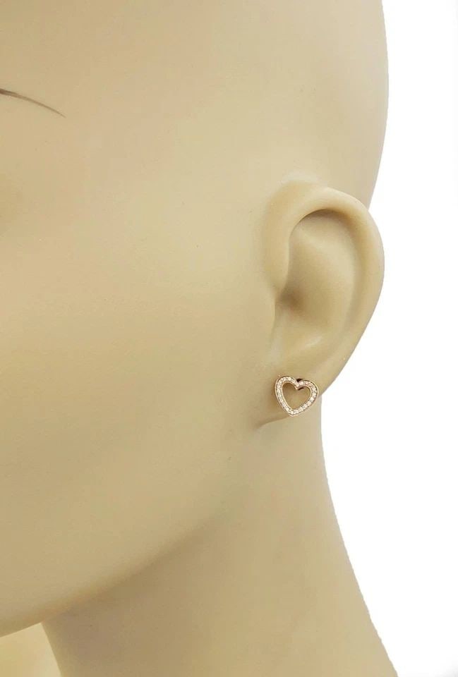 TIFFANY & CO. METRO STUD EARRINGS DIAMOND 18K ROSE GOLD HEART: TIFFANY & CO. METRO STUD EARRINGS DIAMOND 18K ROSE GOLD HEART Tiffany & Co. Metro Diamond 18k Rose Gold Heart Stud Earrings Description This elegant authentic pair of earrings are by Tiffany & Co. fro