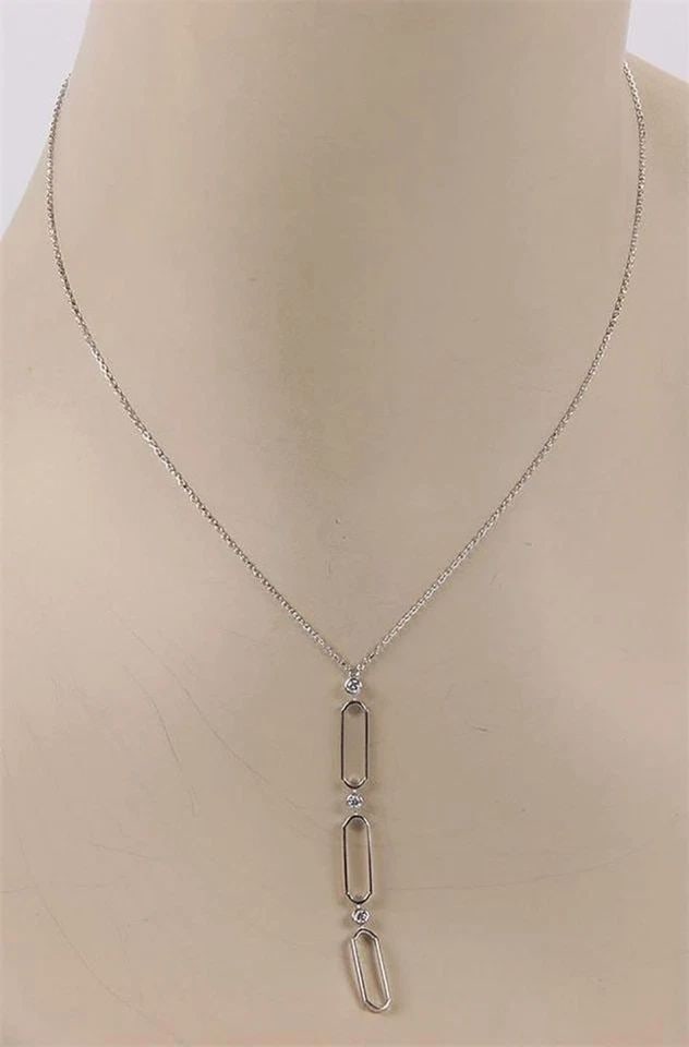 TIFFANY & CO. 3 TIER GOLD NECKLACE DIAMOND 18K WHITE PENDANT: TIFFANY & CO. 3 TIER GOLD NECKLACE DIAMOND 18K WHITE PENDANT The Tiffany & Co. 3 Tier Gold Necklace features a beautiful long pendant set in 18k white gold. The necklace is signed by Tiffany & Co. and