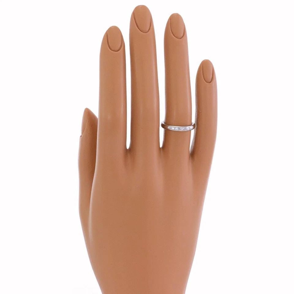 TIFFANY & CO. PERETTI DIAMOND RING PLATINUM WEDDING BAND SIZE 4.5: TIFFANY & CO. PERETTI DIAMOND RING PLATINUM WEDDING BAND SIZE 4.5 Tiffany & Co. Peretti 3 Diamond Platinum Wedding Band Ring Size 4.5 Description This authentic wedding band ring is from Tiffany & Co.