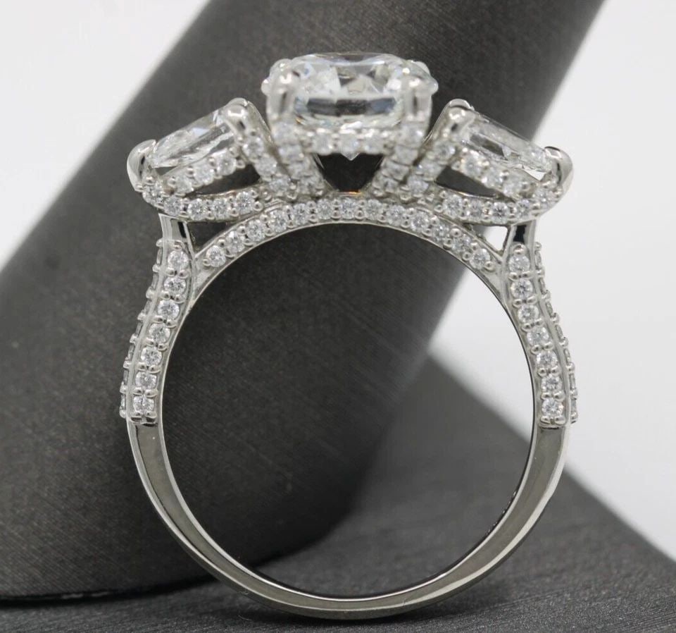 PLATINUM 3.25 TCW VS2 G NATURAL DIAMOND OLD EUROPEAN CENTER ENGAGEMENT RING: PLATINUM 3.25 TCW VS2 G NATURAL DIAMOND OLD EUROPEAN CENTER ENGAGEMENT RING Description Platinum 3.25 TCW Natural Diamond Old European Center Engagement Ring Ring is in great condition. May show signs