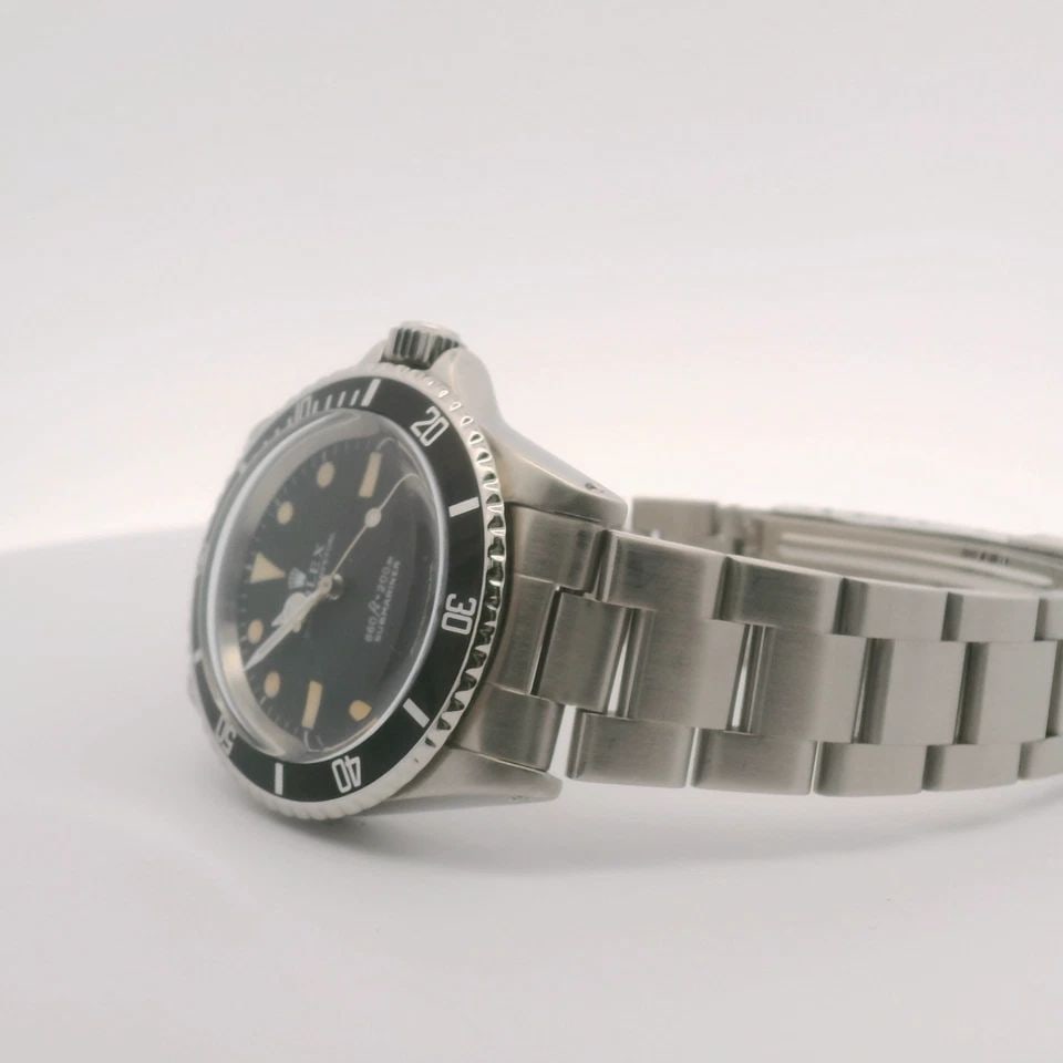 VINTAGE 1969 ROLEX OYSTER PERPETUAL SUBMARINER 40MM BLACK DIAL WATCH 5513: VINTAGE 1969 ROLEX OYSTER PERPETUAL SUBMARINER 40MM BLACK DIAL WATCH 5513 Description Rolex Oyster Perpetual Submariner 1969 Vintage 40mm Black Patina Dial Watch 5513 The watch has been used previousl