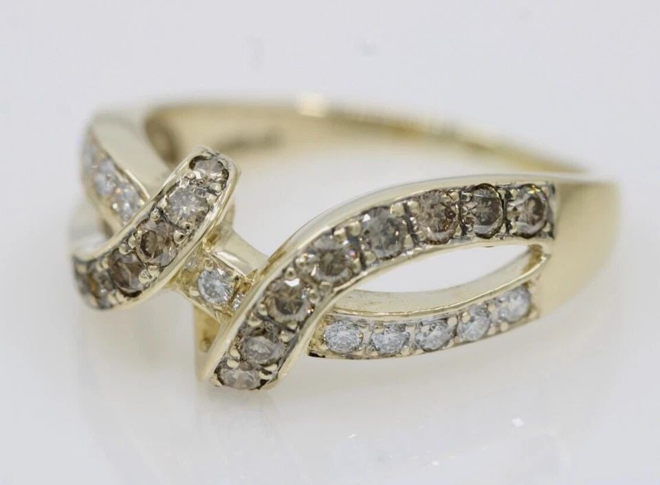 LEVIAN 14K YELLOW GOLD 0.75 TCW CHOCOLATE & WHITE DIAMOND CROSSOVER RING SIZE 9: LEVIAN 14K YELLOW GOLD 0.75 TCW CHOCOLATE & WHITE DIAMOND CROSSOVER RING SIZE 9 LEVIAN 14K YELLOW GOLD 0.75 TCW CHOCOLATE & WHITE DIAMOND CROSSOVER RING SIZE 9 Description LeVian 14K Yellow Gold 0.75 