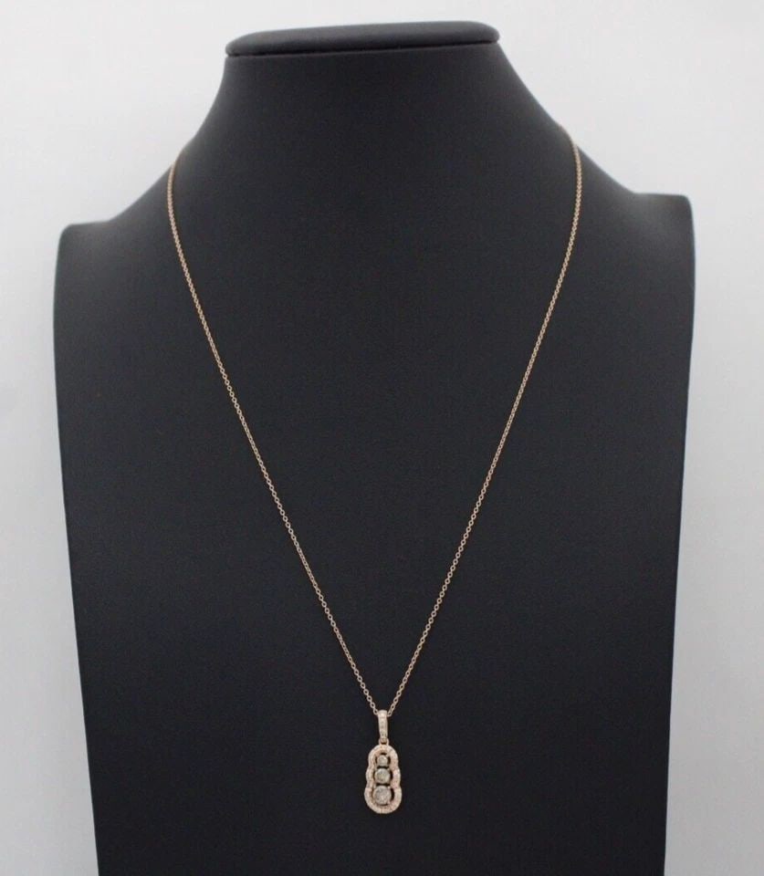 LEVIAN 14K ROSE GOLD NATURAL CHOCOLATE & WHITE DIAMOND PENDANT W/ 18" NECKLACE: LEVIAN 14K ROSE GOLD NATURAL CHOCOLATE & WHITE DIAMOND PENDANT W/ 18" NECKLACE LEVIAN 14K ROSE GOLD NATURAL CHOCOLATE & WHITE DIAMOND PENDANT W/ 18" NECKLACE Description LeVian 14K Rose Gold 0.60 TCW 