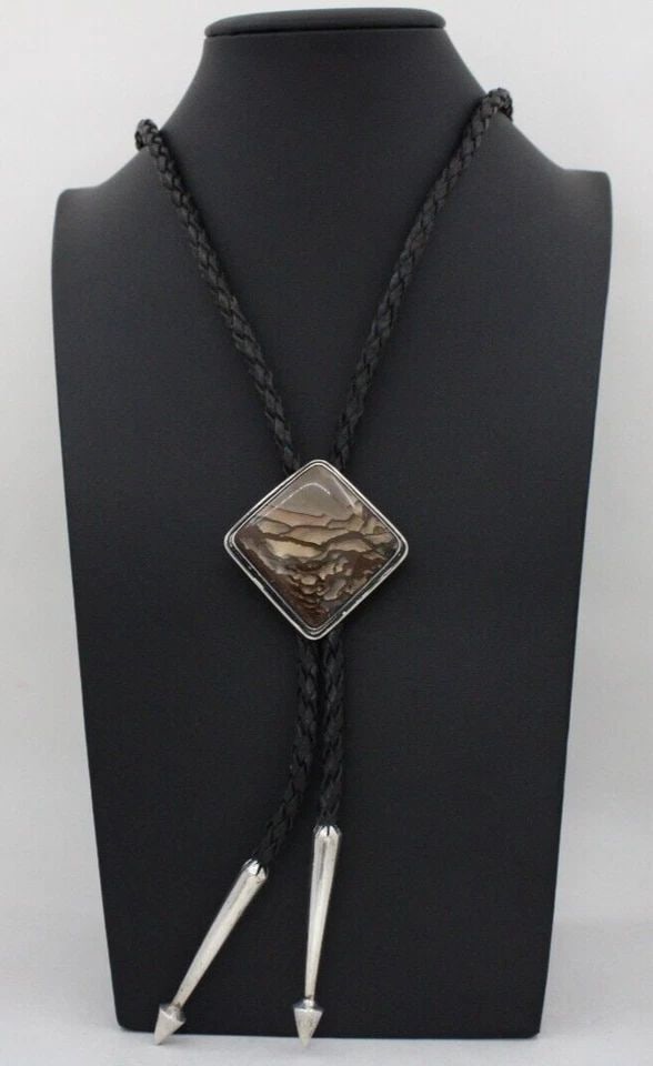 NAVAJO FRANK PATANIA JR STERLING SILVER DESCHUTES JASPER LEATHER BOLO TIE: NAVAJO FRANK PATANIA JR STERLING SILVER DESCHUTES JASPER LEATHER BOLO TIE NAVAJO FRANK PATANIA JR STERLING SILVER DESCHUTES JASPER LEATHER BOLO TIE Description Frank Patania Jr Sterling Silver Deschut