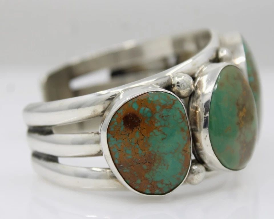E. ETSITTY NAVAJO STERLING SILVER TURQUOISE WIDE CUFF BRACELET 6.5" - 79.8 GRAMS: E. ETSITTY NAVAJO STERLING SILVER TURQUOISE WIDE CUFF BRACELET 6.5" - 79.8 GRAMS E. ETSITTY NAVAJO STERLING SILVER TURQUOISE WIDE CUFF BRACELET 6.5" - 79.8 GRAMS Description E. Etsitty Navajo Sterling
