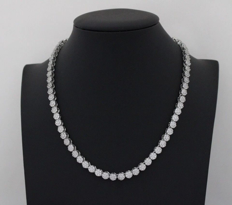 STERLING SILVER 5.5 MM CLUSTER FLOWER STATION TENNIS 16.5" NECKLACE 41.3 GR: STERLING SILVER 5.5 MM CLUSTER FLOWER STATION TENNIS 16.5" NECKLACE 41.3 GR Description Sterling Silver 5.5 mm Cluster Flower Station Tennis 16.5" Necklace Necklace is in great condition. May show sig