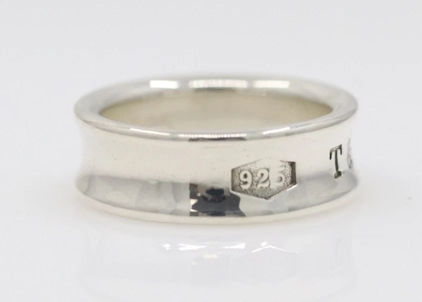 1997 TIFFANY & CO. STERLING SILVER 1837 CONCAVE BAND RING SIZE 6 - 6.6 GRAMS: 1997 TIFFANY & CO. STERLING SILVER 1837 CONCAVE BAND RING SIZE 6 - 6.6 GRAMS Description 1997 Tiffany & Co. Sterling Silver 1837 Concave Band Ring Ring is in good condition. May show signs of wear and