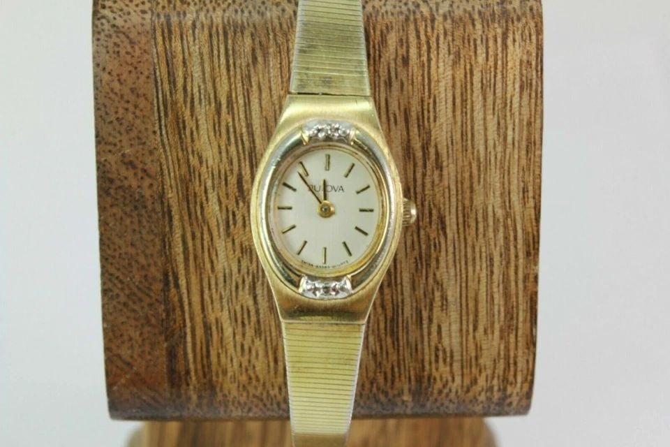 BULOVA DIAMOND & GOLD PLATED ACCENT BEZEL GOLD TONE STAINLESS ST. BRACELET WATCH: BULOVA DIAMOND & GOLD PLATED ACCENT BEZEL GOLD TONE STAINLESS ST. BRACELET WATCH Bulova Diamond & Gold Plated Accent Bezel Gold Tone Stainless Steel Bracelet Watch NEW battery installed great working 