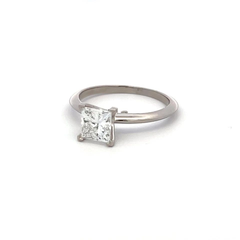 TIFFANY & CO 1.50 CARAT PRINCESS CUT F VS1 DIAMOND PLATINUM ENGAGEMENT RING: TIFFANY & CO 1.50 CARAT PRINCESS CUT F VS1 DIAMOND PLATINUM ENGAGEMENT RING Designer: Tiffany & Co Title: Tiffany & Co 1.50 Carat Princess Cut F VS1 Diamond Platinum Engagement Ring Style: Engagement 