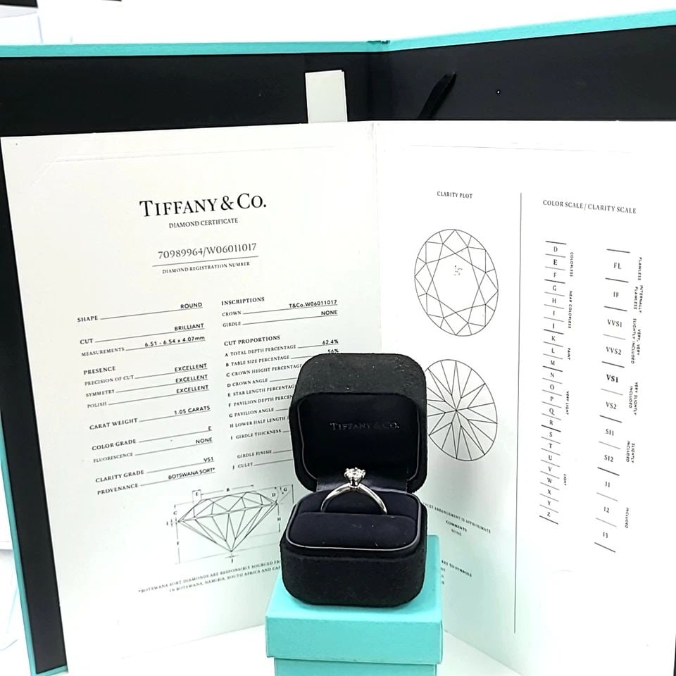 TIFFANY & CO. 1.05 CARAT ROUND BRILLIANT E VS1 DIAMOND PLATINUM ENGAGEMENT RING: TIFFANY & CO. 1.05 CARAT ROUND BRILLIANT E VS1 DIAMOND PLATINUM ENGAGEMENT RING Title: Tiffany & Co 1.05 Carat Round Brilliant E VS1 Diamond Platinum Engagement Ring Style: Engagement Metal: Platinum 